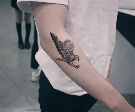 minimalist hawk tattoo